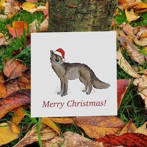 Feestelijke wolf | Wolf-kerstkaart | Kerstmuts wolven | luxe gerecycled | ecokaart | feestmuts wolf kaart | aquarelillustratie |