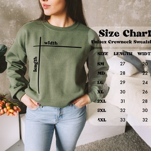 K&ouml;nnte beinhalten: Gr&ouml;&szlig;entabelle f&uuml;r einen Unisex-Crewneck-Sweatshirt. Die Tabelle zeigt die Gr&ouml;&szlig;e, die L&auml;nge in Zoll und die Breite in Zoll. Die Gr&ouml;&szlig;en umfassen: Small, Medium, Large, Extra Large, 2XL, 3XL und 4XL.
