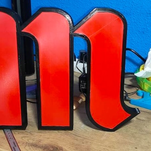 Illuminated sign Mahou San Miguel