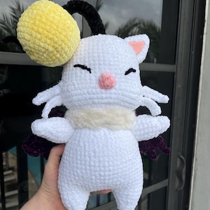 Kitty bat crochet plush.