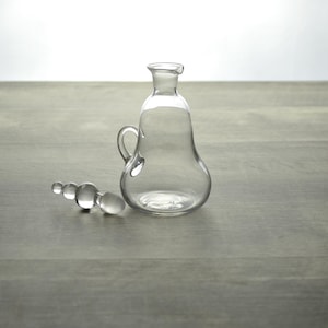 Vintage Clear Glass Cruet with Graduated Sphere Stopper, Teardrop Shape, Decorative Handle, Elegant Glassware