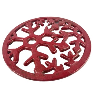 Vintage Mid-Century Red Enamel Cast Iron Trivet with snowflake Cutout Design