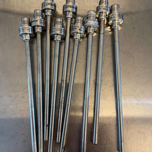 May include: A collection of nine silver-colored metal RTD temperature sensors with long, thin probes and threaded connectors. Each sensor features the brand name ProSense printed on the cylindrical housing along with technical specifications.