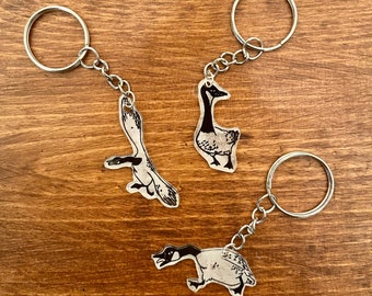 Chagrijnige gans Shrinky Dink sleutelhangers