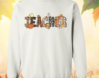 Pumpkin-themed fall teacher shirt; teacher shirt; back-to-school shirt; kindergarten shirt; teacher fall shirt