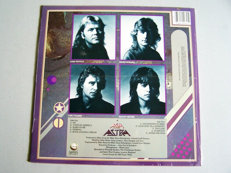 May include: The back cover of the Asia Astra album features four band member portraits in individual boxes. The album title and track listings are visible. The color scheme includes purple, white, and gold accents.