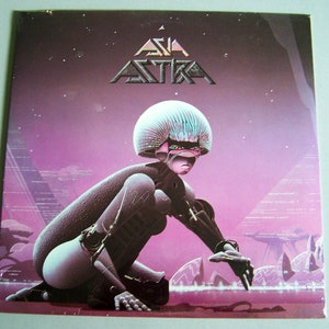 May include: Album cover for "Asia Astra" featuring a futuristic figure in a purple and pink landscape. The album title is at the top in a stylized font. The artwork has a science fiction theme with a retro aesthetic.