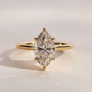 Marquise Cut Moissanite Engagement Ring: Six Prong Solitaire, 2.10 CT