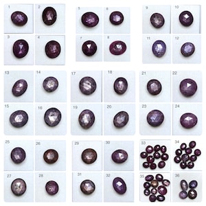 Puede incluir: Una colección de treinta y seis gemas facetadas, ovaladas y redondas, en varios tonos de púrpura y rojo. Cada gema se muestra en un cuadrado blanco, numerado del 1 al 36. Las gemas varían en tamaño y corte, mostrando sus características.