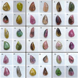 May include: A collection of 36 gemstone leaf carvings in various colors, including green, pink, brown, and yellow. Each leaf is intricately carved with detailed veining, showcasing the natural beauty of the stones. The leaves are displayed on a neutral background.
