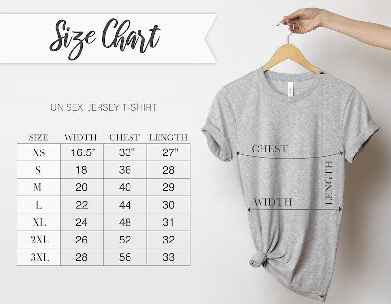 May include: A light gray unisex jersey t-shirt hanging on a wooden hanger. The image includes a size chart with measurements in inches for width, chest, and length, ranging from XS to 3XL. The text "Size Chart" is at the top.