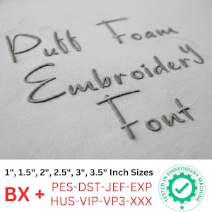 May include: Close-up of embroidered text on a light gray fabric. The text reads "Puff Foam Embroidery Font" in a handwritten style. Below, it lists sizes from 1 to 3.5 inches. Additional text includes file formats and a logo.
