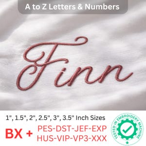 May include: Embroidered name "Finn" in a script font, in a reddish-brown thread, on a white fabric. The text "A to Z Letters & Numbers" is at the top. Sizes available: 1", 1.5", 2", 2.5", 3", and 3.5" inches. Includes embroidery file formats.