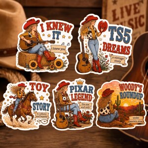 May include: A set of five die-cut stickers featuring a cowgirl character in various scenes. Text includes I KNEW IT, TS5 DREAMS, TOY STORY, PIXAR LEGEND, and WOODY'S ROUNDUP. The illustrations show a guitar, a horse, and desert landscapes.