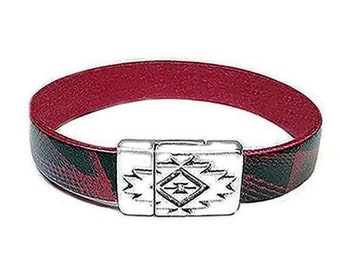 May include: A red leather bracelet with a silver clasp featuring a geometric design. The bracelet has a black and red plaid pattern on one side.