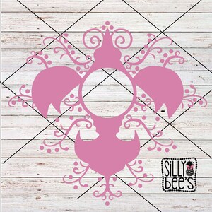 May include: A pink monogram frame with a floral design. The frame is empty and ready for a letter to be added. The design is intricate and detailed, with swirls and leaves.