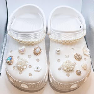 13 pieces of Unique charms, Bow charms, Flower charms, Clogs Charms. Adults and Kids, string