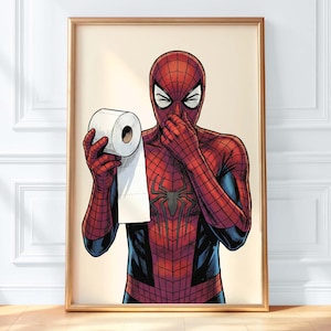 Peut inclure: Une impression d'art encadrée représentant une illustration de style bande dessinée d'un super-héros en costume rouge et bleu tenant un rouleau de papier toilette blanc. Le personnage se couvre le nez d'une main, comme s'il sentait une odeur.