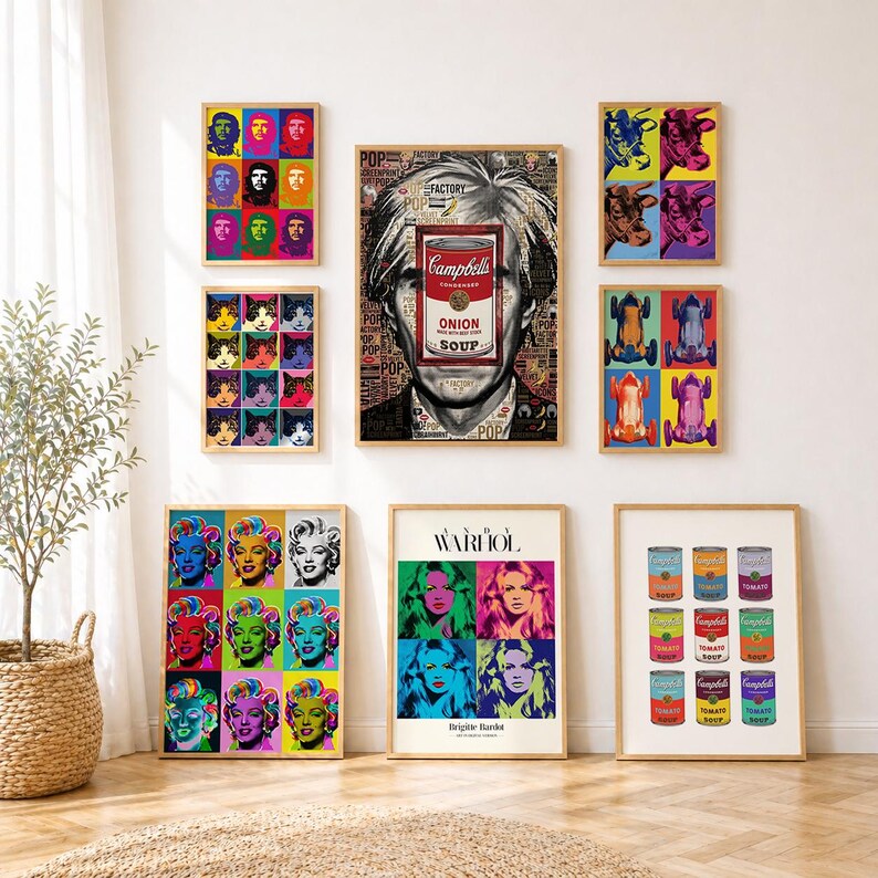 May include: A gallery wall featuring eight framed pop art prints. The collection includes multi-colored grids of portraits, a large central portrait with a Campbell's Onion soup can overlay, a Brigitte Bardot print, and a grid of Campbell's soup cans.