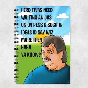 May include: Spiral-bound notebook with a cartoon illustration of a man and text. The text reads "I ERD TWAS NEED WRITING AN JUS UN OV PENS N SUCH IN IDEAS ID SAY WIZ MORE THEN HAHA YA KNOW?" The background is a blue sky and green grass.