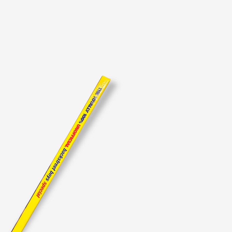 May include: A yellow and blue pencil with the text "The Totally Unofficial Backstreet Boys Special" printed on it.