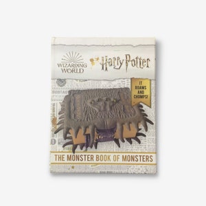May include: A book titled "The Monster Book of Monsters" with a brown, three-eyed monster on the cover. The book is from the Wizarding World of Harry Potter and says "It roams and chomps!"
