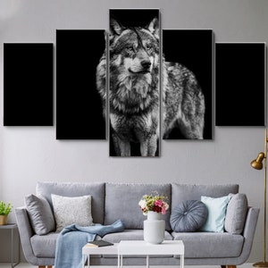May include: A black and white canvas print of a wolf looking directly at the camera. The wolf is in the center of the image and is surrounded by a black background. The print is divided into five sections.