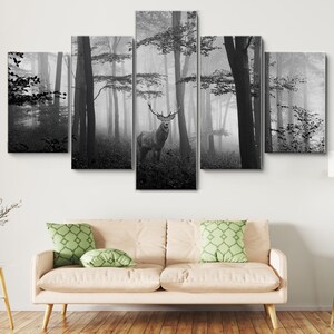 May include: A black and white canvas print of a deer standing in a foggy forest. The print is divided into five panels.