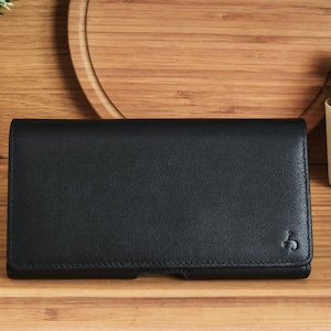 Funda de piel de becerro auténtica y suave, con clip para cinturón para iPhone 12-16 Pro Max y cierre magnético para mantener el teléfono seguro en la funda.