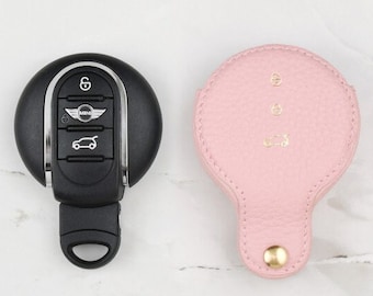 Funda para llave y llavero de Mini Cooper en piel auténtica con grano de guijarro rosa