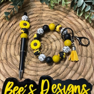 Sunflower Daisy and Cow Print Wristlet and Pen Set