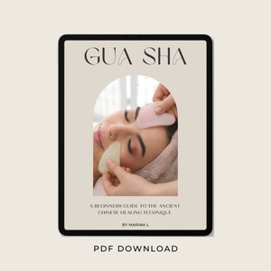 May include: A digital tablet screen displaying a guide to Gua Sha, an ancient Chinese healing technique. The image shows a woman receiving a facial massage with a Gua Sha tool. The text on the screen reads "Gua Sha", "A Beginners Guide to the Ancient Chinese Healing Technique", "By Marina L", and "PDF Download".