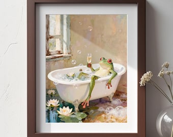 May include: A framed wall art print featuring a green frog with red eyes relaxing in a white clawfoot bathtub filled with bubbles. The frog holds a glass of champagne. White water lilies float in the water surrounding the base of the tub.