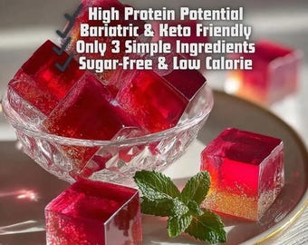 May include: A clear glass bowl filled with translucent red gelatin cubes, each featuring a gold-dusted base. Text reads: High Protein Potential, Bariatric & Keto Friendly, Only 3 Simple Ingredients, Sugar-Free & Low Calorie. Fresh mint leaves sit nearby.