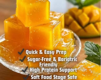May include: A close-up of a stack of bright yellow, square-shaped mango gelatin cubes on a clear glass plate. The text on the image reads: Quick & Easy Prep, Sugar-Free & Bariatric Friendly, High Protein Support, and Soft Food Stage Safe.