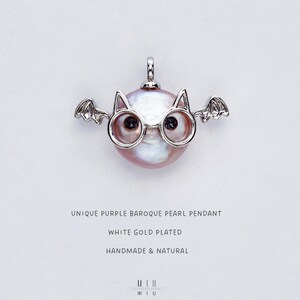 Iridescent Little Devil Pendant: Handmade Baroque Pearl Charm. Natural Freshwater Pearl