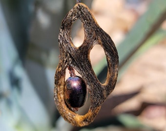 2032 Cholla cactus pendant with blue-brown glass bead.