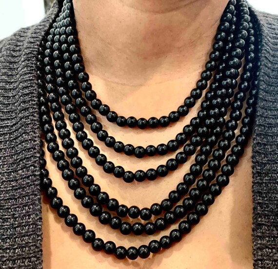 Multi layered beaded necklace deals
