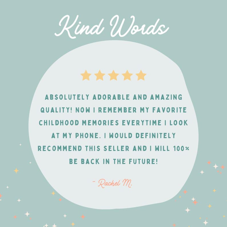 May include: A light teal background with a white oval containing text and gold stars. The text reads "Kind Words" and a customer review: "Absolutely adorable and amazing quality!" The review is signed "Rachel M."