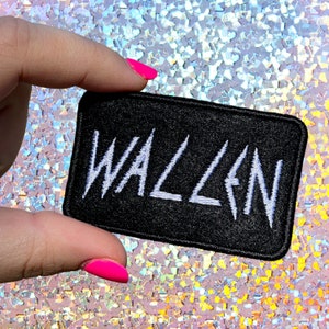 May include: Black iron-on patch with white embroidered text that reads "WALLEN".