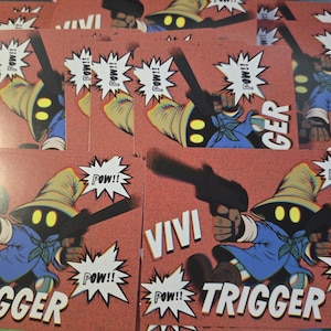 May include: A collection of red cards featuring a cartoon character in a blue robe and hat, holding a gun. The cards have the words "VIVI" and "TRIGGER" in white, with "POW!!" in speech bubbles.