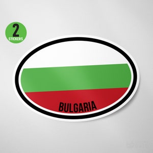 May include: Two oval stickers with the Bulgarian flag. The flag is white with a green stripe and a red stripe. The text "BULGARIA" is printed in black below the flag.