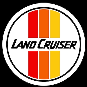 May include: A white circle with a black outline and the text "LAND CRUISER" in black. Inside the circle are three vertical stripes: red, orange, and yellow.