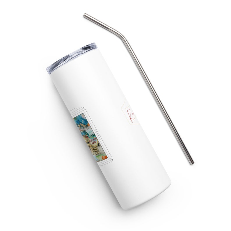 May include: White stainless steel tumbler with a colorful image of a building and the text "Eastern Auto" printed on it. The tumbler has a silver lid and comes with a silver metal straw.