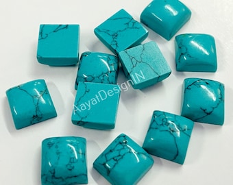 May include: Ten turquoise cabochon gemstone squares with black veining. The stones are approximately 1 inch in size.
