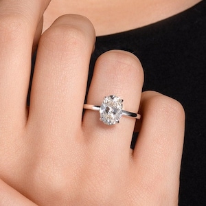 1.5ct Oval Cut Lab Diamond in a Classic Solitaire Minimalist Engagement Ring