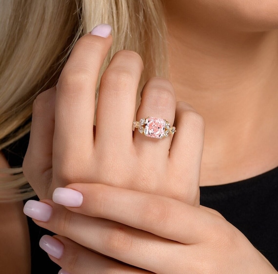 Diamond ring with pink side stones deals