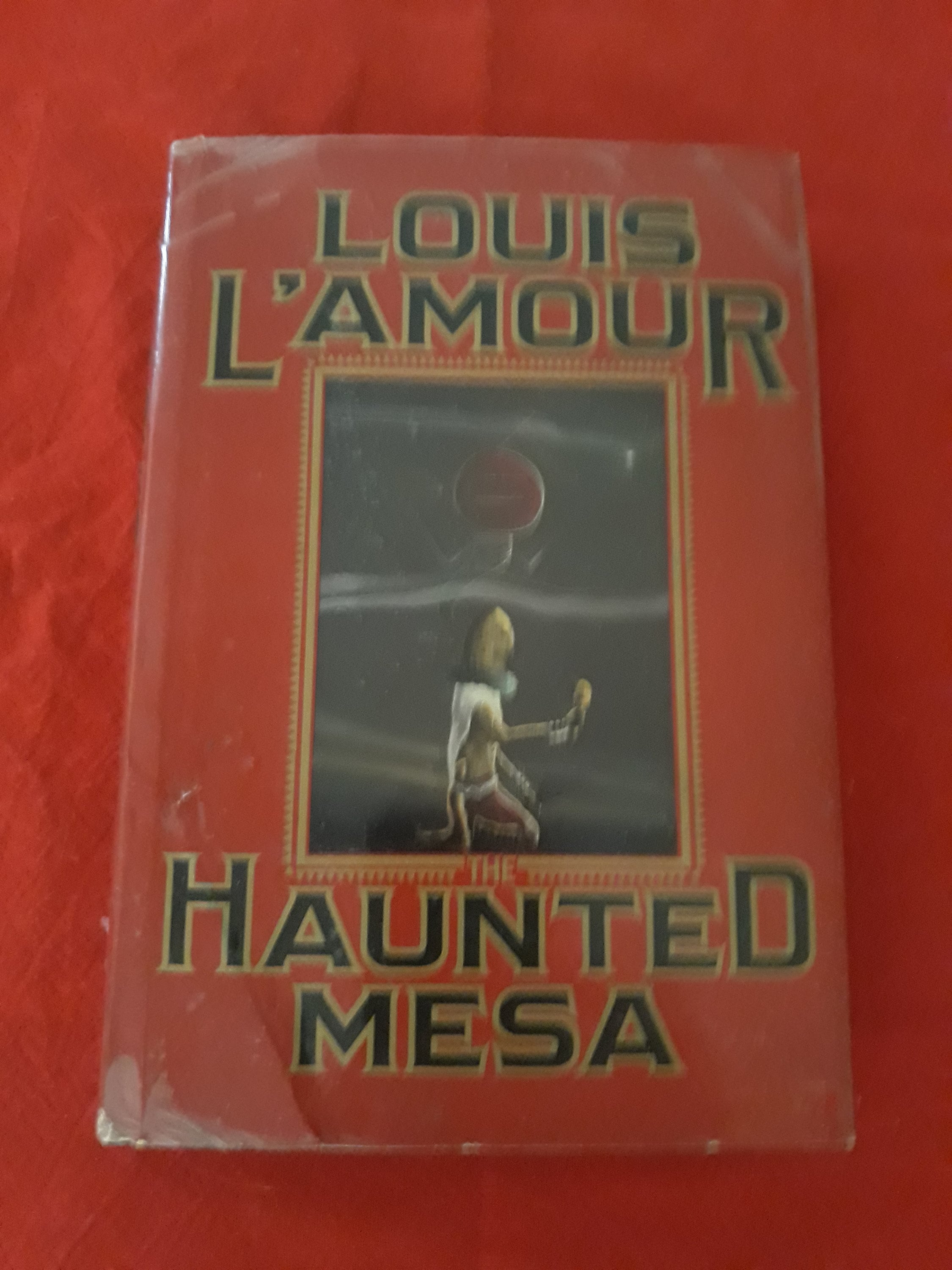 Vintage hardcover edition of Louis L' amour's Haunted Mesa