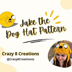 May include: A yellow crocheted hat featuring the character Jake the Dog with large white eyes and a black nose. The text reads Jake the Dog Hat Pattern and Crazy 8 Creations @Crazy8Creationss. The hat has ear flaps and a textured yarn construction.