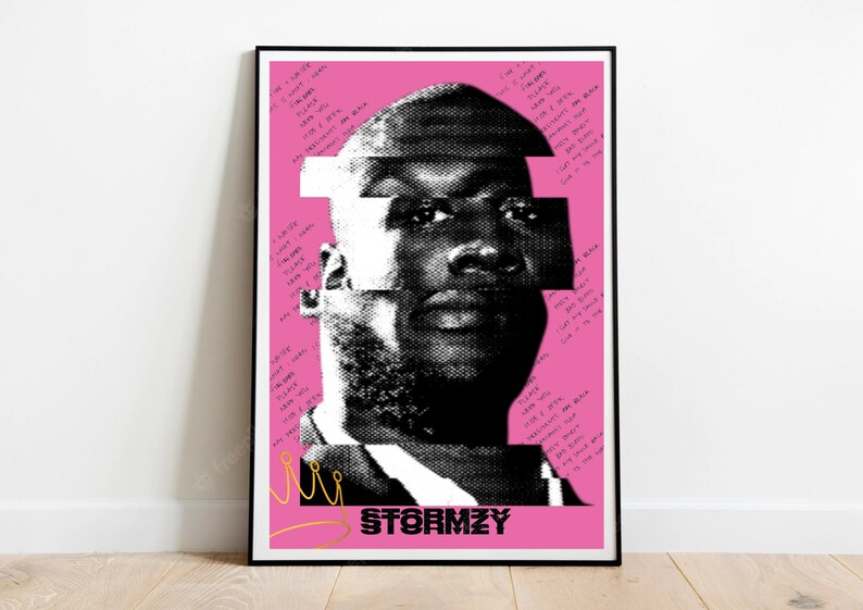 May include: A framed poster featuring a black and white portrait of Stormzy on a pink background. The image is stylized with geometric shapes and handwritten text. The word "STORMZY" is printed at the bottom.